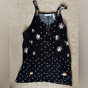 LUQ tank top. Black with white polka dots and flowers. Size small